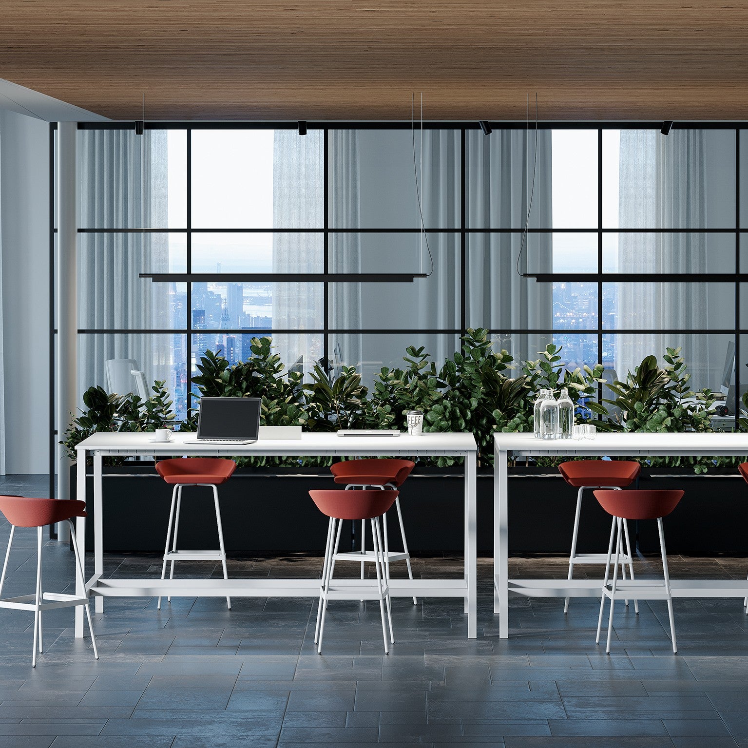 Lungo tavolo alto POP ACE Frezza con sgabelli rossi in un open space